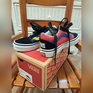 Vans shoes. Size Toddler 11. Runs small. Colors are black, red, yellow, blue
